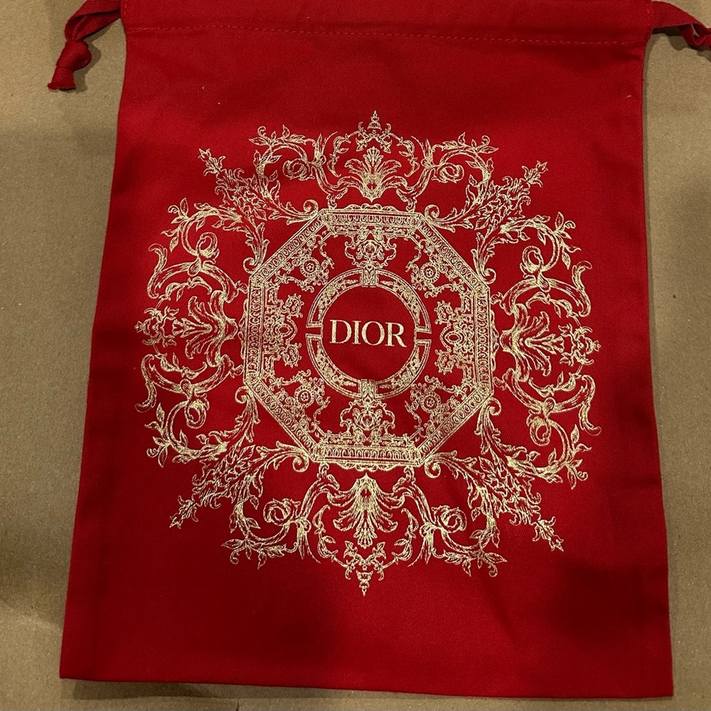 Lot of 4 dior beauty pouches and 1 Valentino pouch